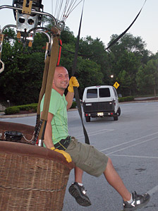 Jon "steps out of the office" after a balloon flight. The deflation process begins at this point, and it will take about 10 minutes to pack the balloon up.